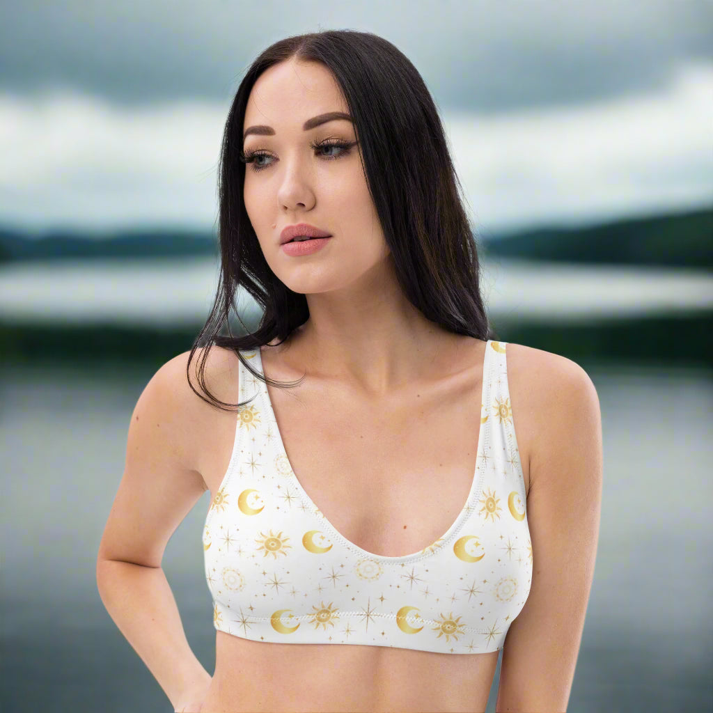 woman wearing a white and gold bikini