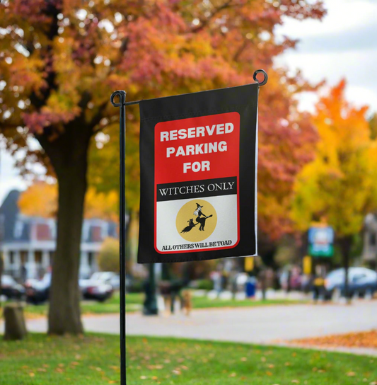 Reserved parking for witches only all others will be toad novelty sign red and black, yellow moon with a pretty witch and black cat on a broom. 