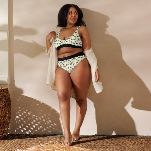 plus size model wearing black and yellow poppy bikini set.